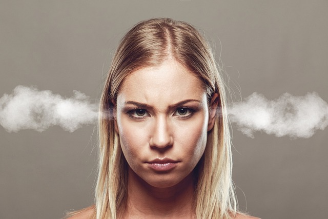 A frustrated woman with steam coming out of her ears