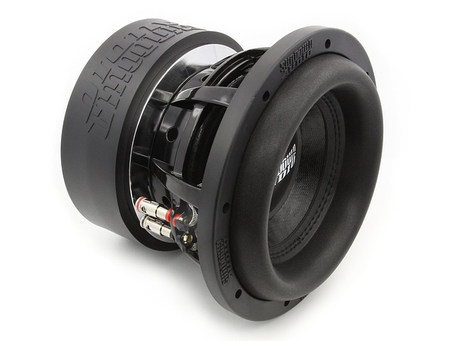 A car audio subwoofer speaker on a white background
