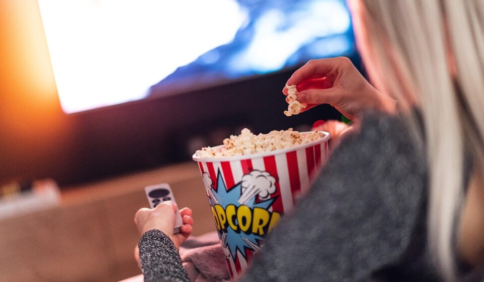 person watching movie on streaming