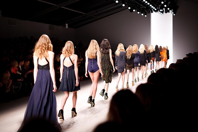 Models walking down a runway during a fashion show