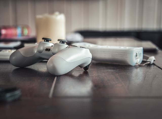 A video game controller resting on a wooden table