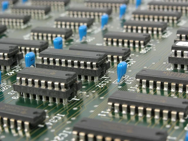 Close-up of microchips on a green circuit board