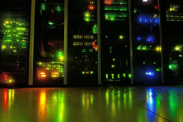 Server racks with glowing LED lights in a dark data center