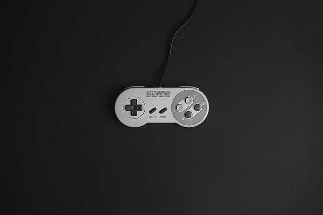 A Super Nintendo controller on a dark background