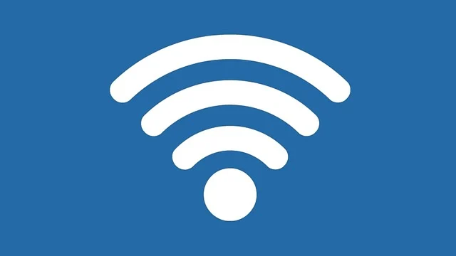 A white Wi-Fi symbol on a blue background.