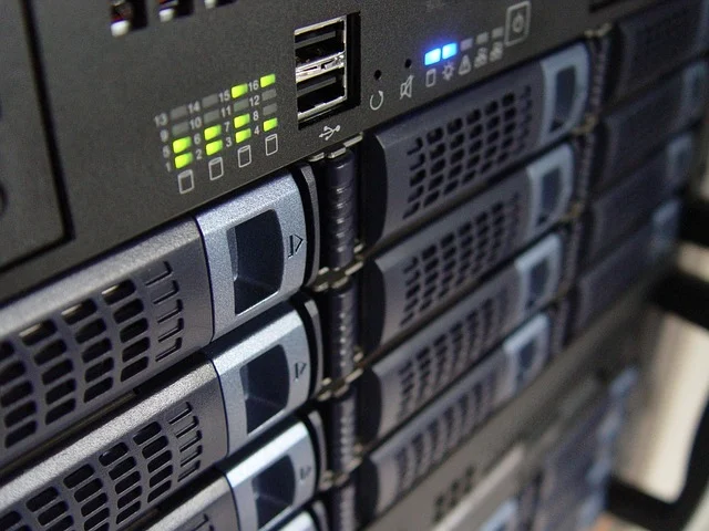 Close-up of server rack with blinking lights and USB ports