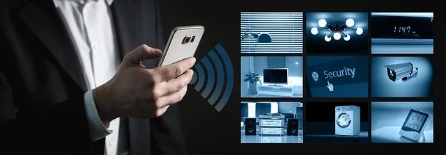 A person using a smartphone to control smart home devices via Wi-Fi.