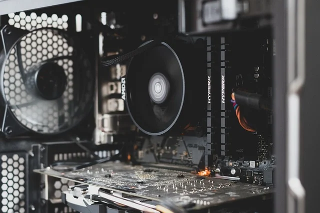 Inside of a computer case showing motherboard, CPU cooler, and RAM
