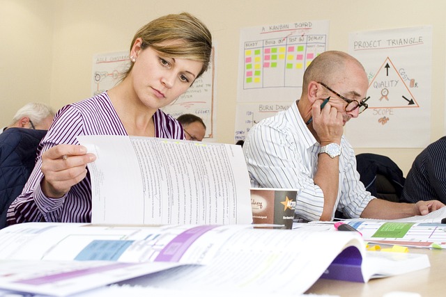 People reviewing documents during a training or strategy session