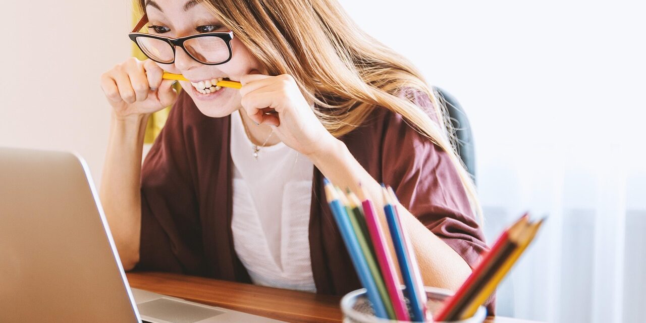 person studying for IT certification with a roadmap