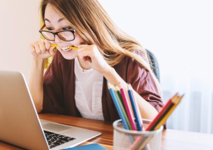 person studying for IT certification with a roadmap